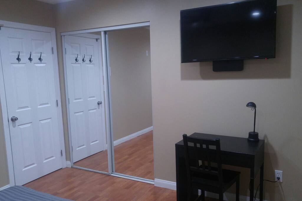 good size closet with divisions inside and mirror doors