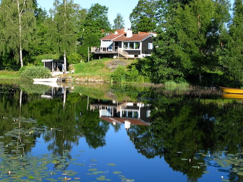 Cosy house by lakeside in beautiful nature