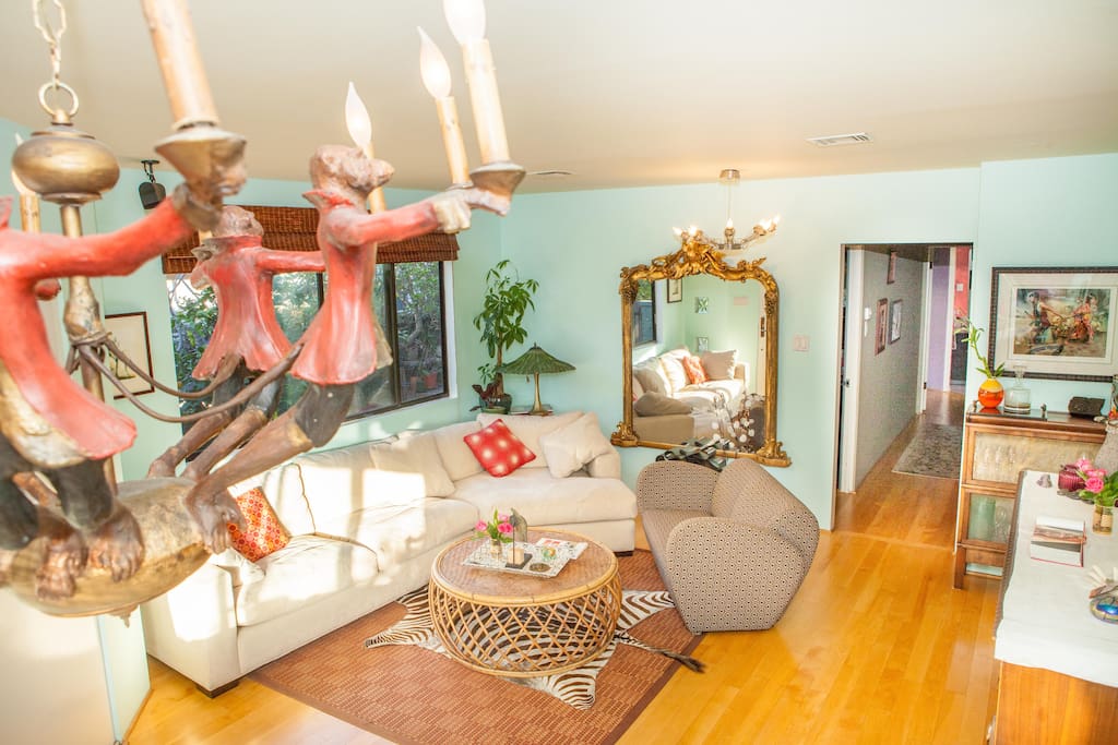 Living room POV monkey chandelier.