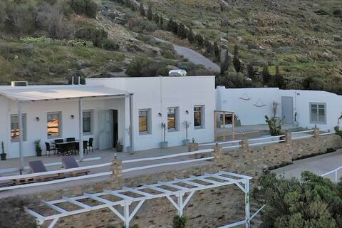 * Uppolis house overlooking the Cyclades islands