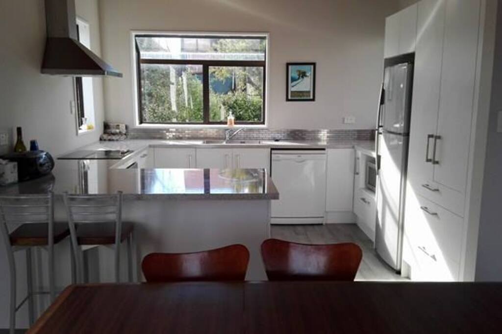 Brand new kitchen with all cooking utensils