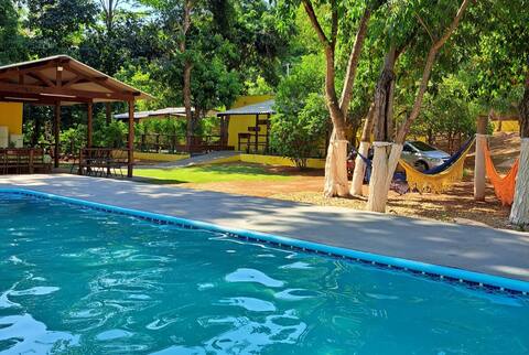 Home, pool, river, wood stove, Wifi and comfort.
