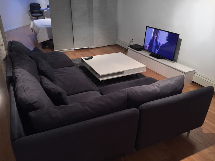 Large, comfy sectional couch with table and television (Netflix, Hulu, Amazon Prime, Youtube, basic cable)