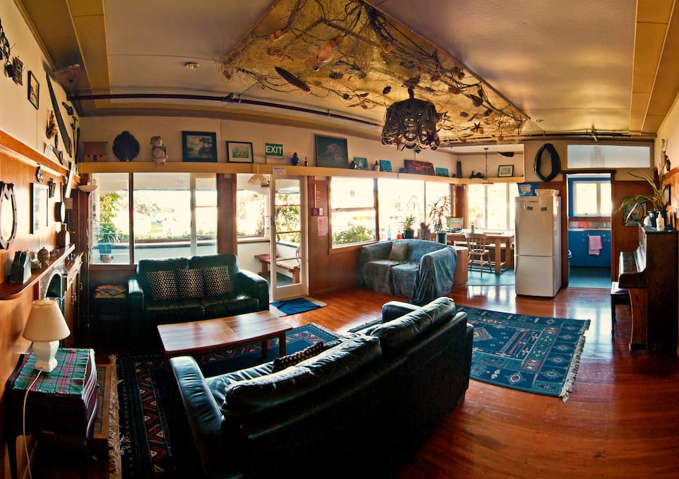 Cosy lounges with roaring log fires. Relaxing balcony with sea views of Russell
