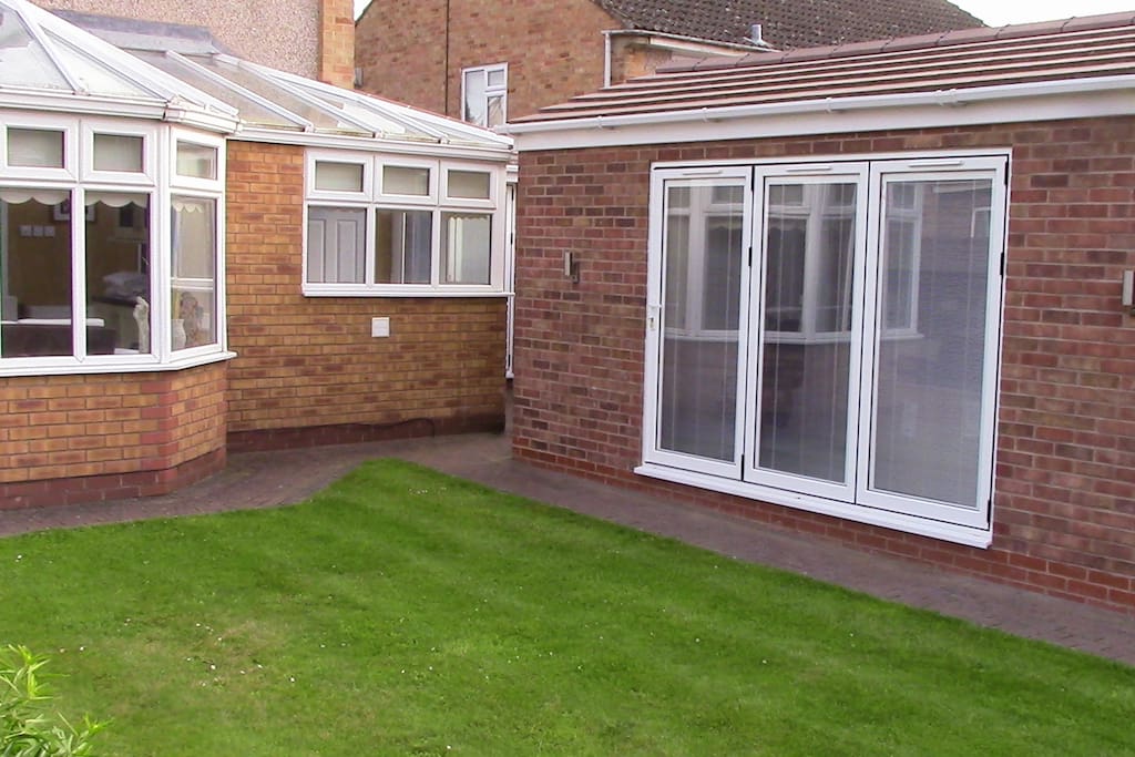 The annex which has bi folding doors looking out onto the garden
