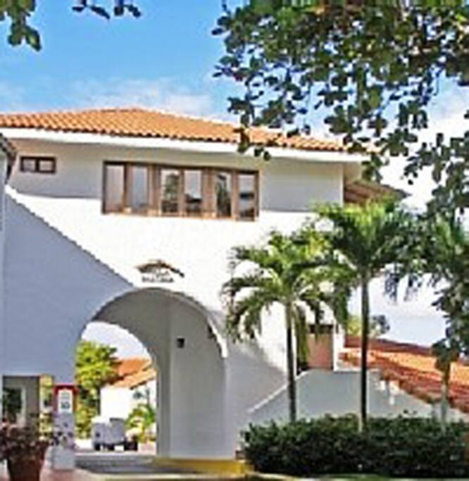 Situated over an elegant archway, this villa offers views in three different directions; the resort grounds, the ocean, and the National Rainforest.