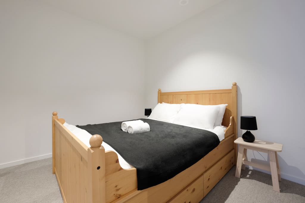 Queen size bed for a relaxed sleep. Turn on the side lamp to enjoy your late night read.