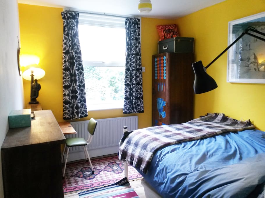 Guestroom with quiet garden outlook. Orthopaedic super comfortable bed with a loo, just for you, conveniently next door.