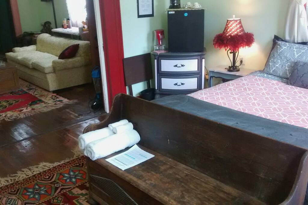 The guest room opens up into the sitting room with closing pocket doors for complete privacy.