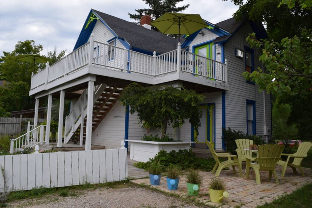 Rear exterior, breezy patio.