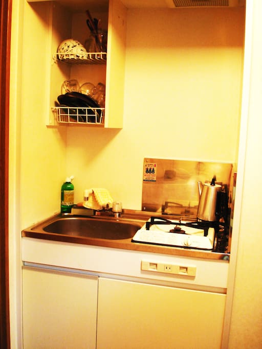 kitchen
there are dishes,glasses,cutlery etc.
