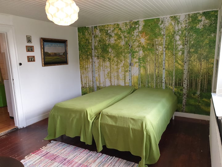 Bedroom to the south, adorned with the lap on the end wall. 