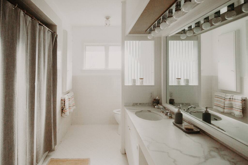 Full private bathroom right outside bedroom.