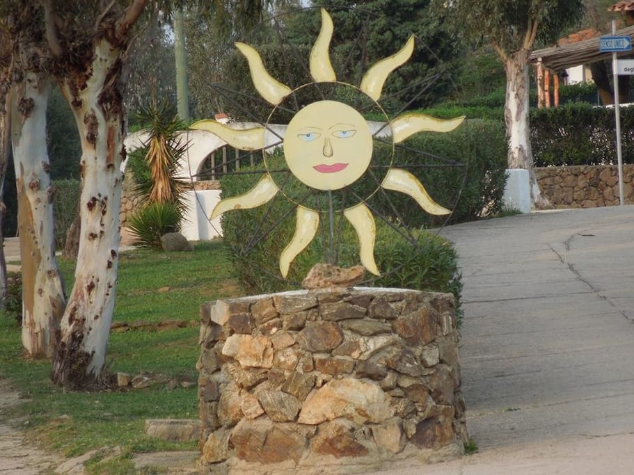 Entrance to Lido del Sole Village with it welcoming yellow Sun iron sculpture