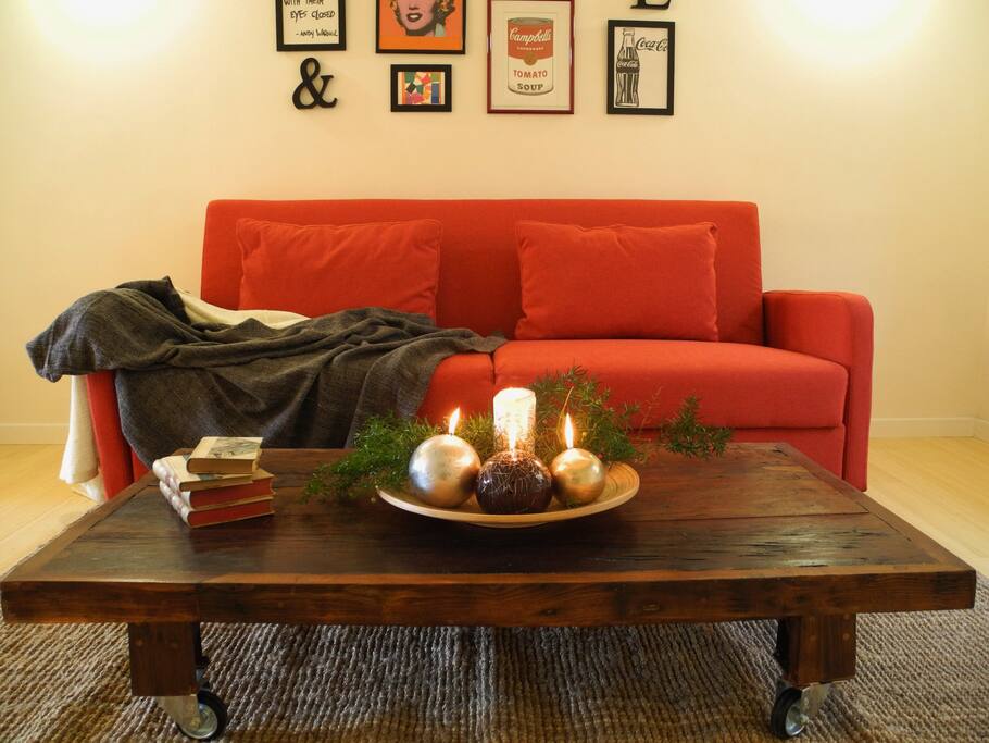 Sofa bed in front there is tv