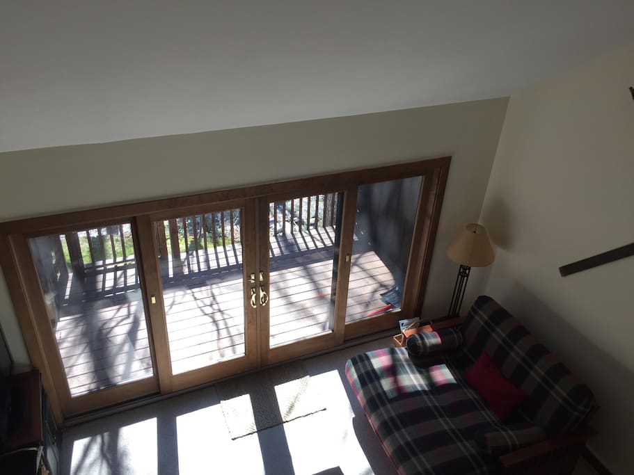 Looking over lofted living room
