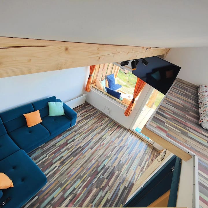 View from the sleeping area to the main room