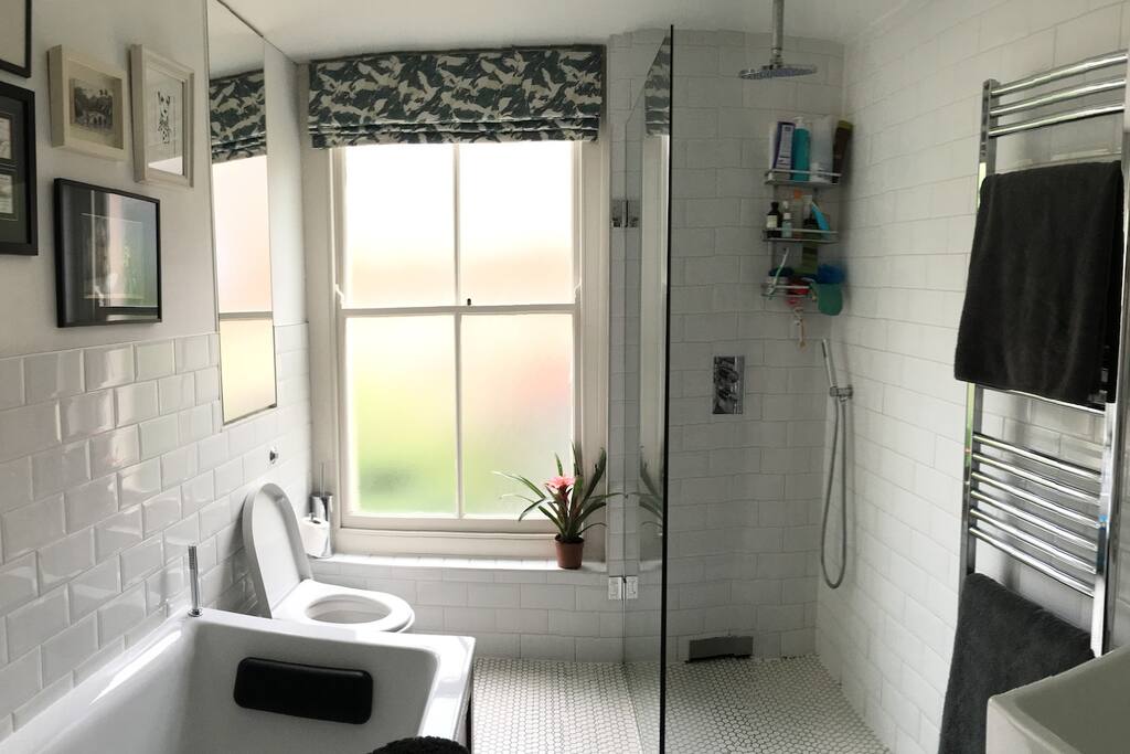 The main bedroom which boasts a lot of light and also a double sink