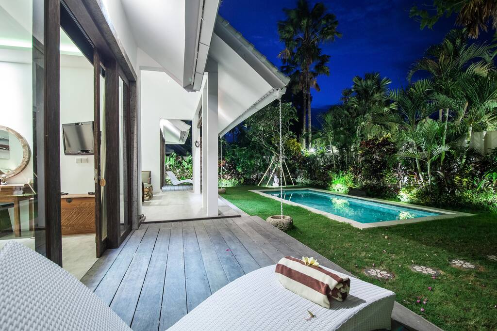 Deck in front of the bedroom one, with the view onto the garden and pool