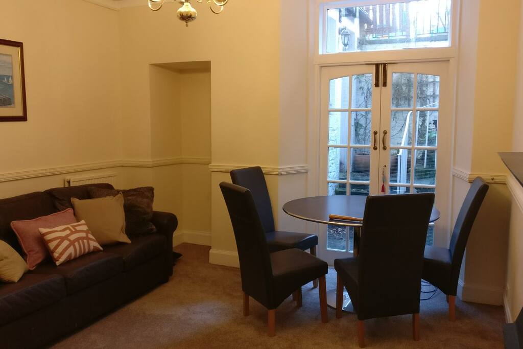 Lounge: patio doors give access to the small outside area