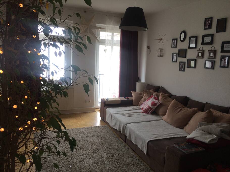 Living room and couch (your space) from a different angle (small balcony off the right window)