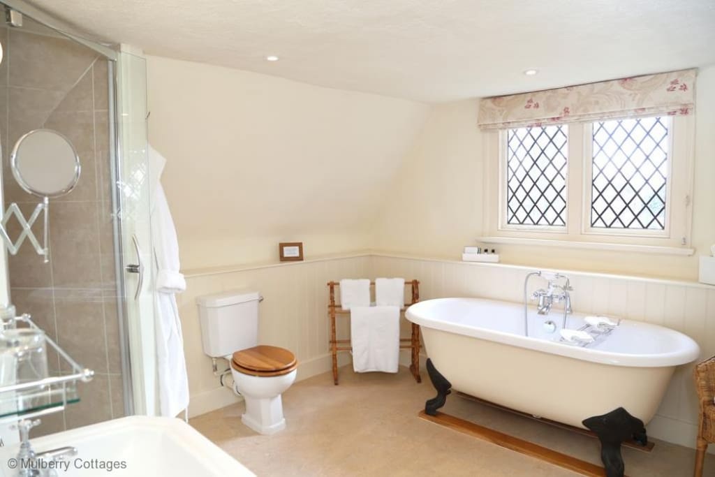 Ensuite bathroom off Bedroom 1 - Roll-top bath, separate shower cubilce, toilet & wshbasin
