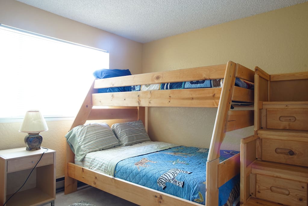 Full mattress for 2 on the bottom with a Leesa memory foam mattress. Twin bed on top with Serta mattress