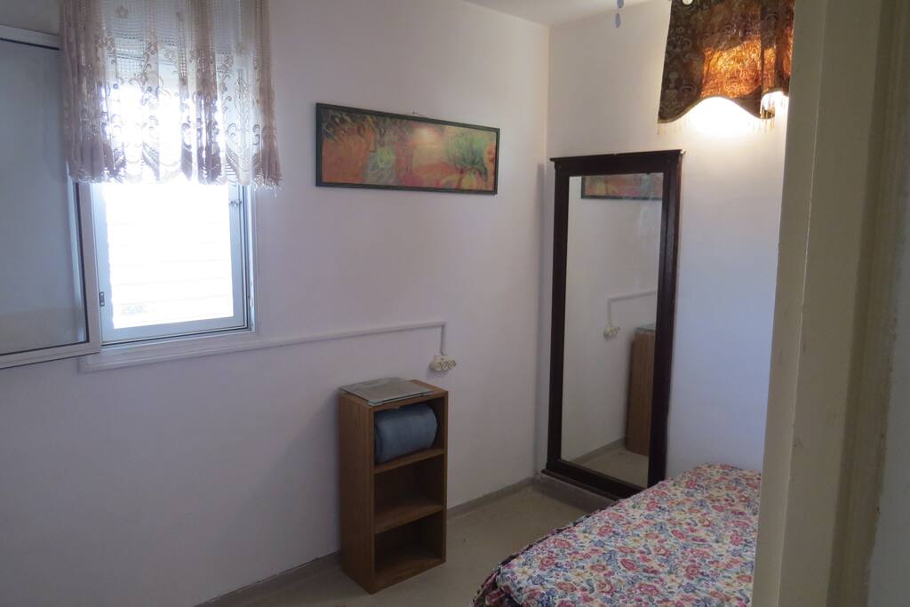 The west room. 200 Shekels per this room per 1 night.