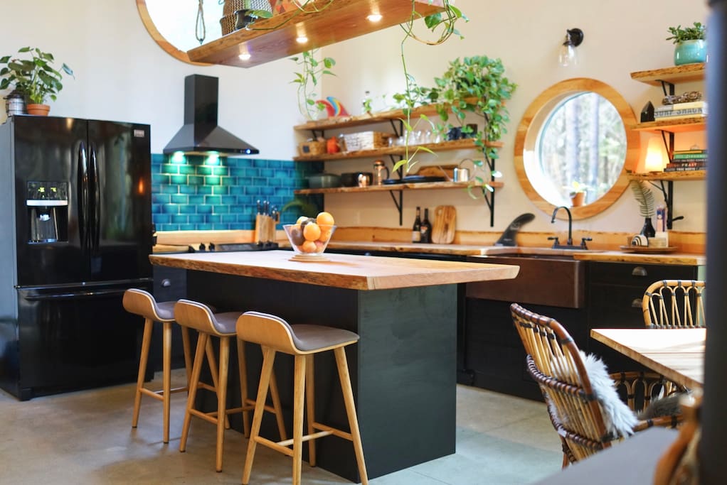 open concept kitchen, island & dining nook