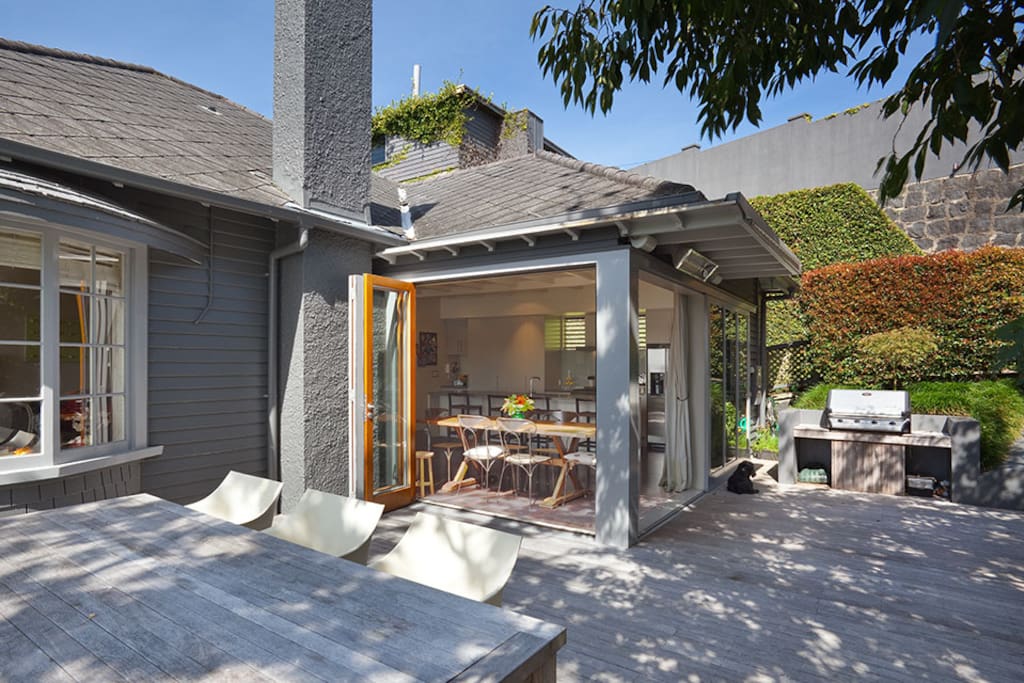 Indoor/outdoor flow from kitchen/living to outdoor dining area