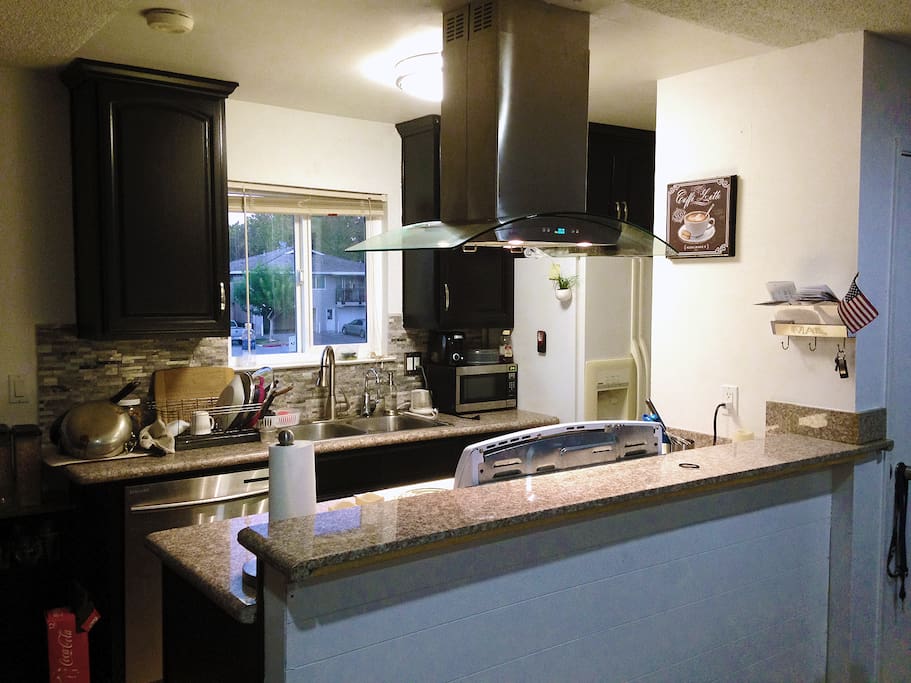 Remodeled Kitchen with new exhaust and stone tilework