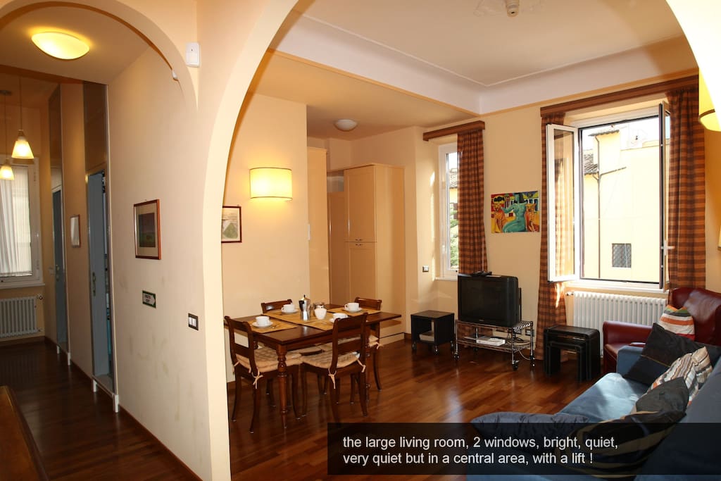 2) the large living room, 2 windows, bright, quiet, quiet but central area, with a lift!