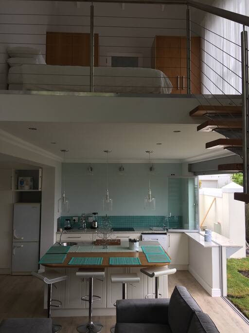 Double volume loft bedroom upstairs with amazing mountain views