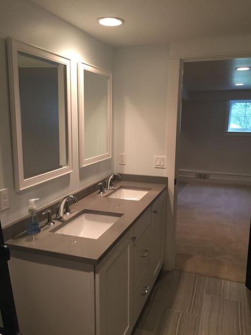 Basement Bath w/ Tub Shower and Double Vanity