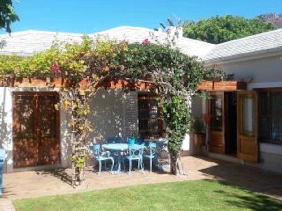 Direct access through French doors to the enclosed grassed patio