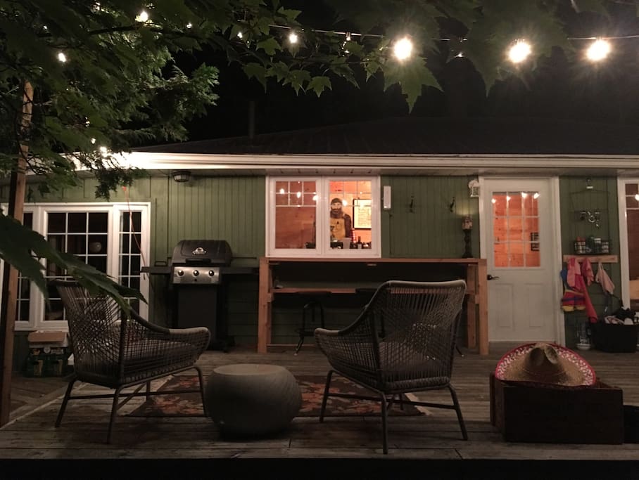 Deck looking into the kitchen at night.