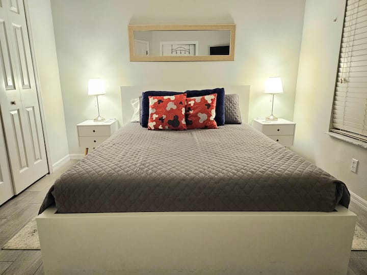 Main floor,  primary bedroom.  Queen bed,  adjoining full bathroom