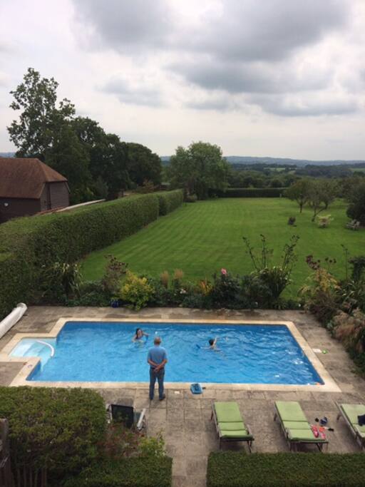 Substantial gardens with views across the valley.