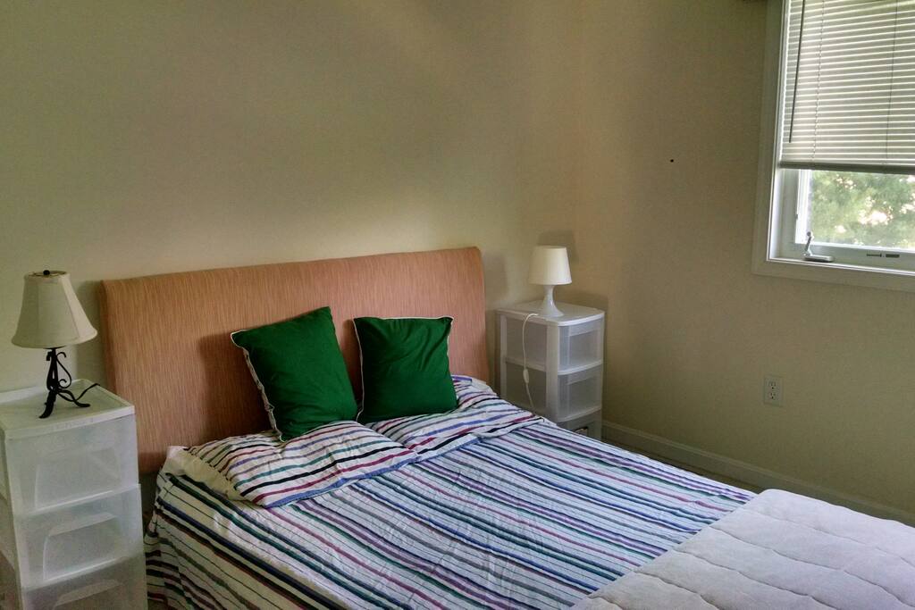 Full size bed with closet storage, night stands, drawers