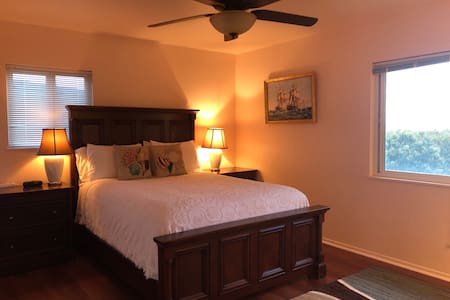 Tranquil Master Bedroom with a Sea View