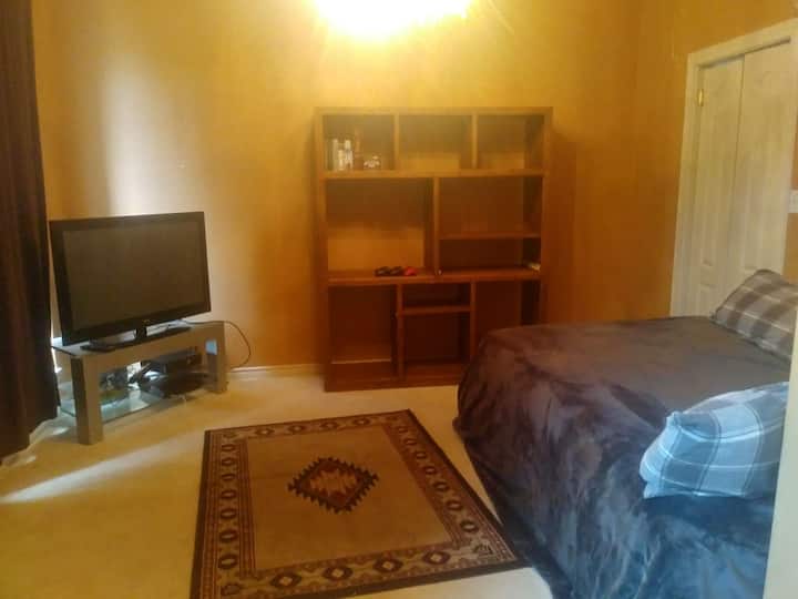 full bed tv with PlayStation and Xbox... game room/bedroom 6