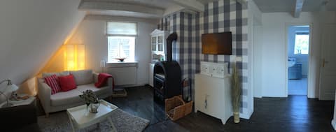 Cozy apartment with fireplace, so close to the sea.