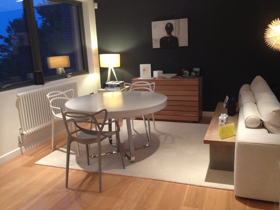 Dining area with expandable table, can seat 8-10