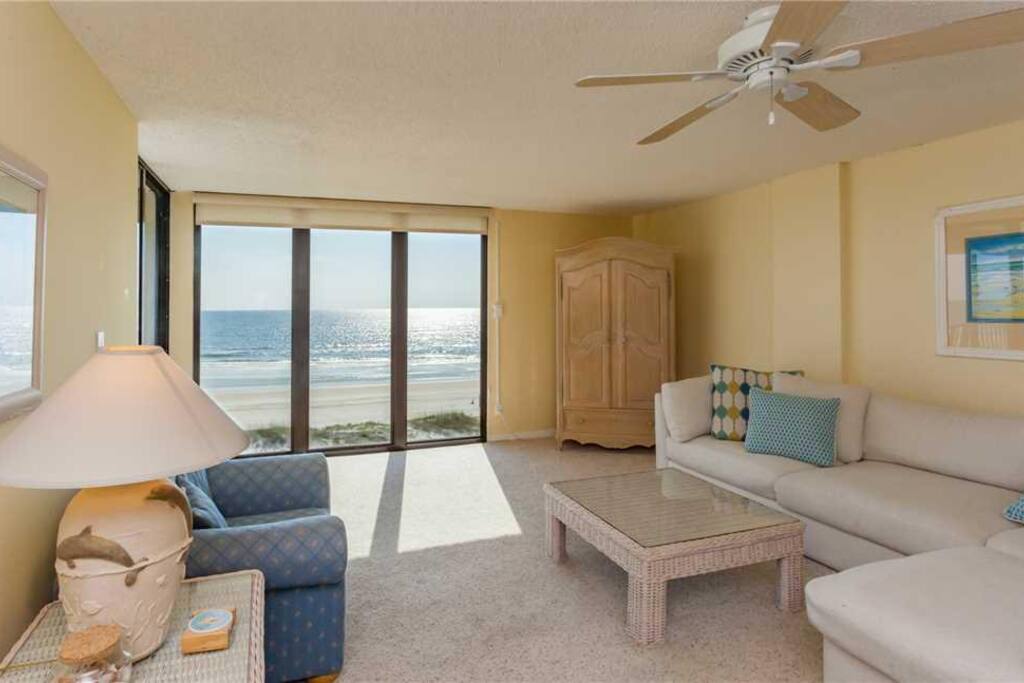 Family Room with a View - Enjoy sitting on the couch and playing a game of cards or watching the waves crash on the beach.