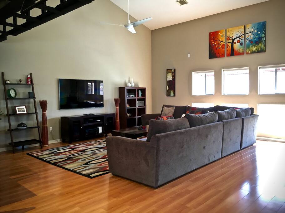 2nd floor living space with wall-mounted cable TV + HBO and high ceilings