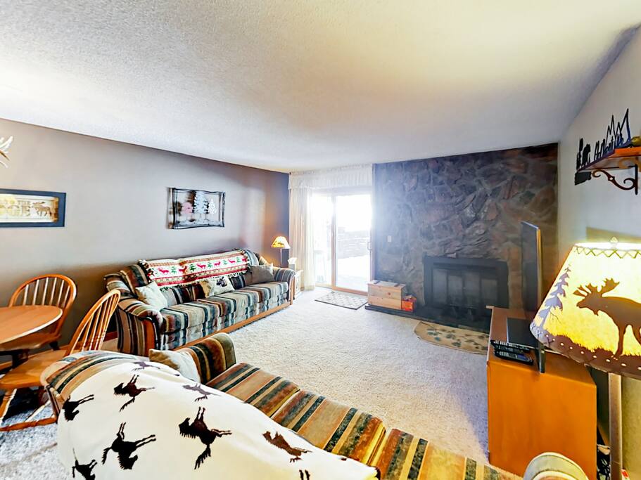 Warm up by the wood-burning fireplace. Your rental home is professionally cleaned by TurnKey's dedicated housekeeping staff.