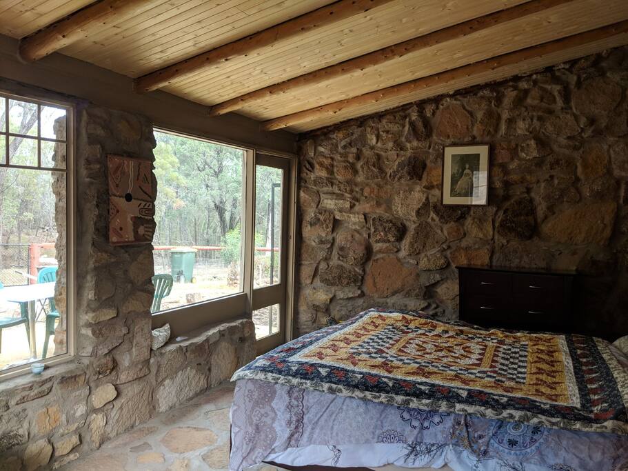 Main bedroom with separate entry to entertainment area please note the patchwork quilt is now in the 2nd bedroom