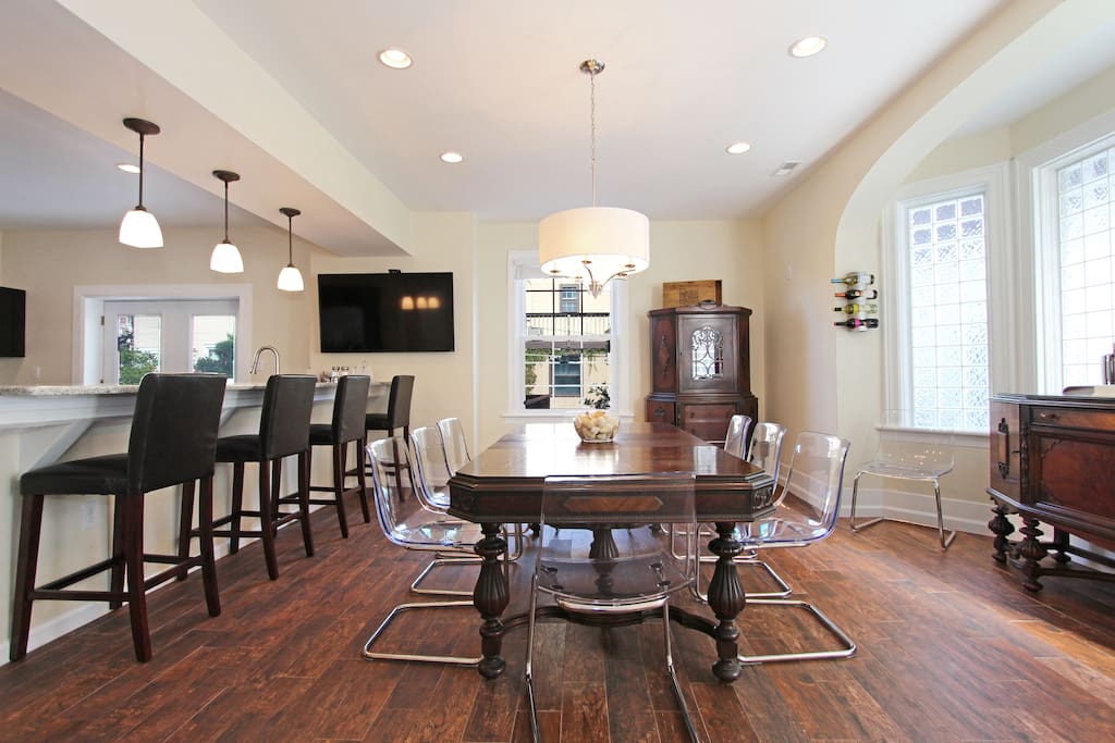 Seating for 18 in kitchen and dining area.