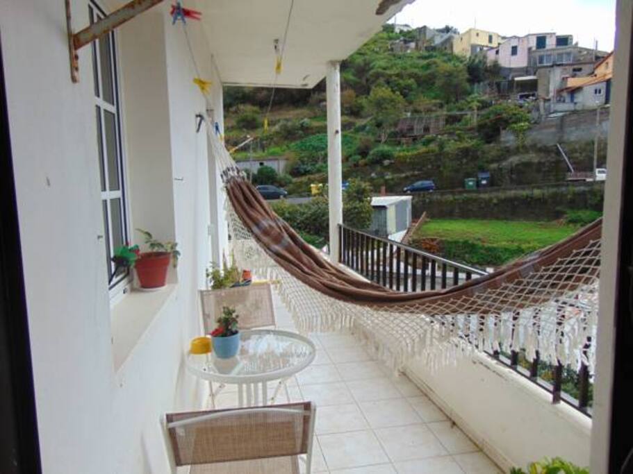 Varanda com rede de descanso