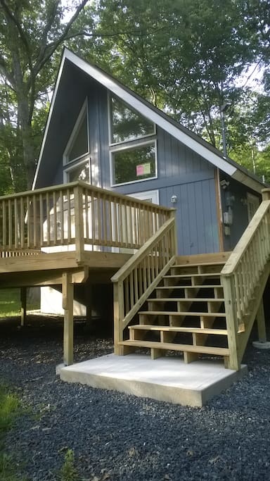 Six foot wide steps leading to the front door and a marvelous deck!
